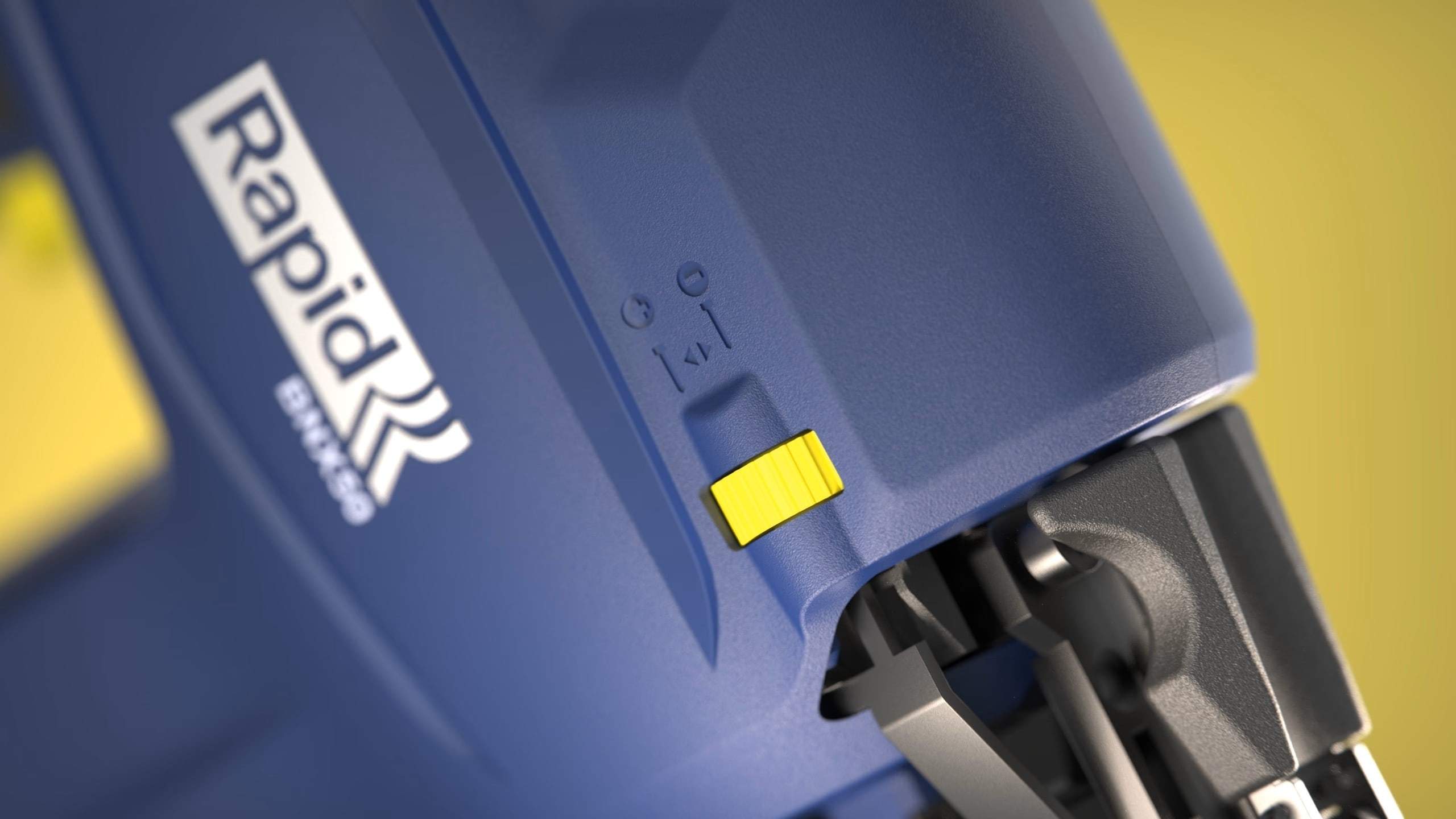 Detail of a Rapid 18V tool with logo and yellow switch