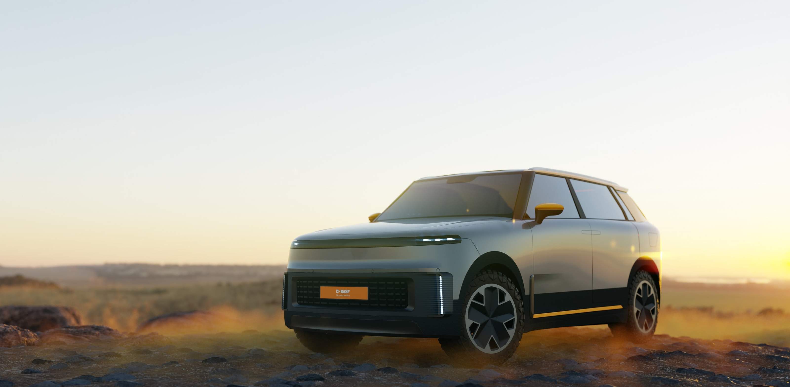 Rendering of the BASF Virtual Car in front view at dusk in an open landscape